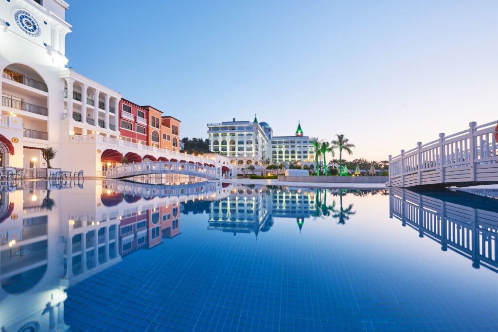 Swimming pool and beach of luxury hotel. Type entertainment complex. Amara Dolce Vita Luxury Hotel. Resort. Tekirova-Kemer